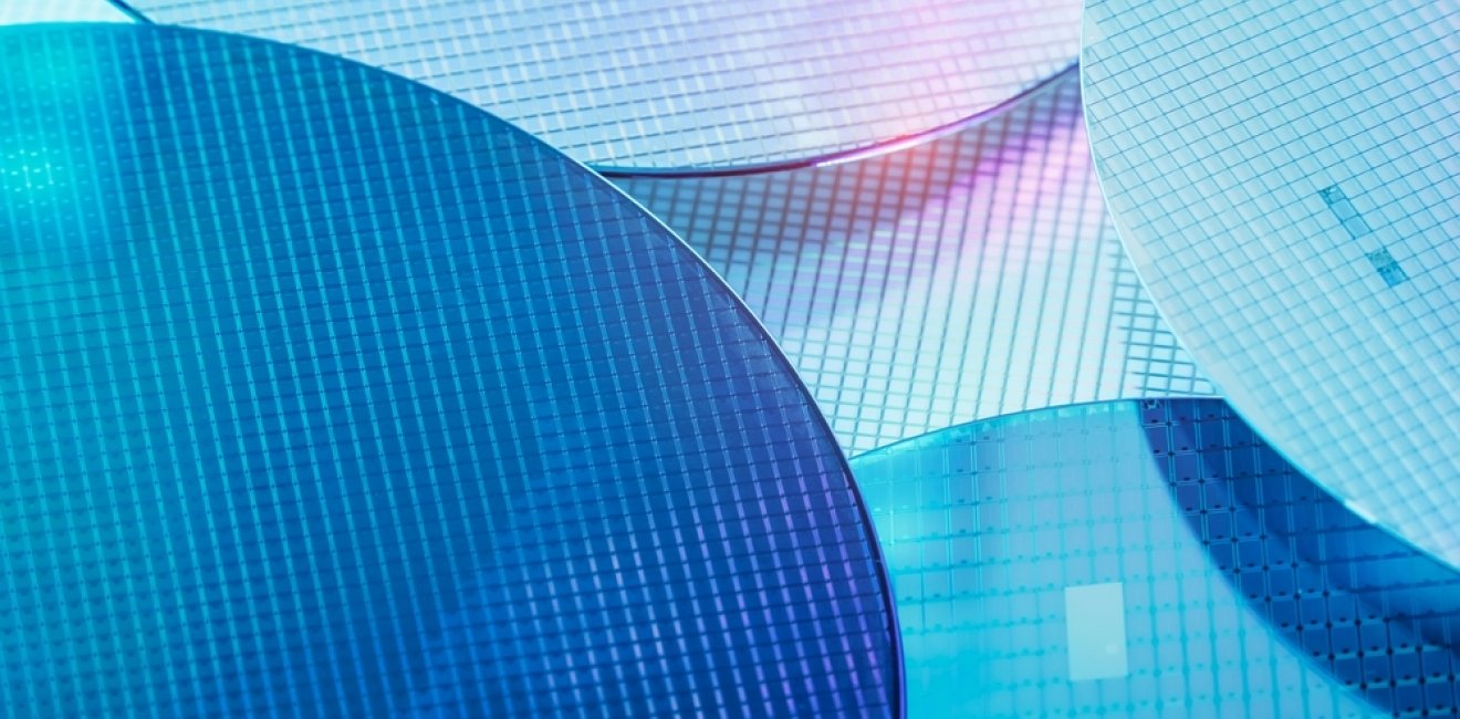 Macro of silicon wafer semiconductor with neon color, integrated circuits to manufacture CPU and GPU