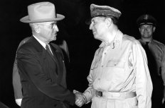 President Harry S. Truman and General Douglas MacArthur at President Truman's arrival at the Wake Island Conference, October 15, 1950.