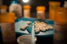 Opioid pills on a prescription tray