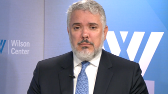 Ivan Duque speaking in front of Wilson Center logo