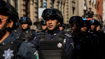 Puebla, Mexico - September 16, 2022: Puebla state police officers walk the streets in a surveillance operation