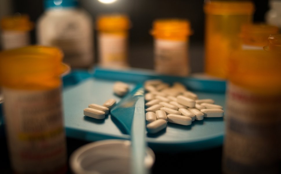 Opioid pills on a prescription tray