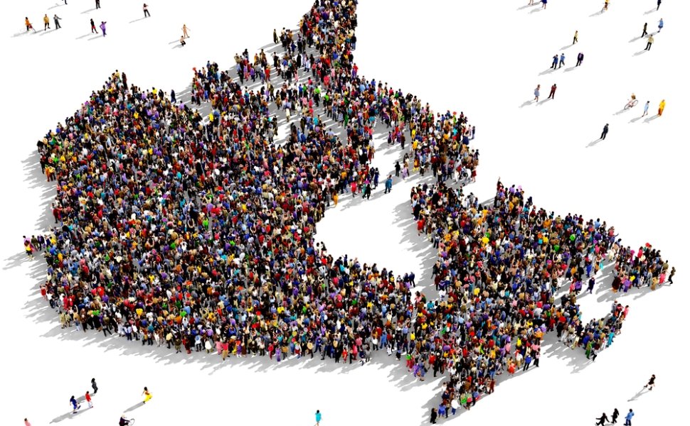 Outline of Canada composed of diverse crowd.