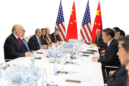 Trump and Xi seated at a conference table