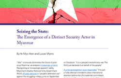 The cover of the report Seizing the State, which shows the flag of Myanmar.