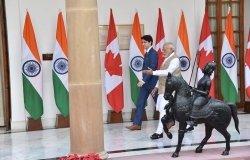 Trudeau and Modi Walking Down a Hall