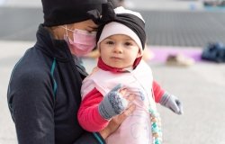  Mom wearing mask with baby