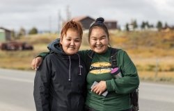 Portrait of two native Inuit women looking at camera, outdoors on Seppala Dr in Nome, Alaska, Ruben M. Ramos/Shutterstock.com, All Rights Reserved. 