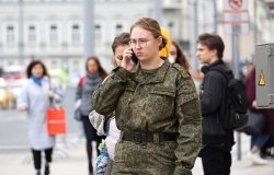 Russian Soldier talking on a phone